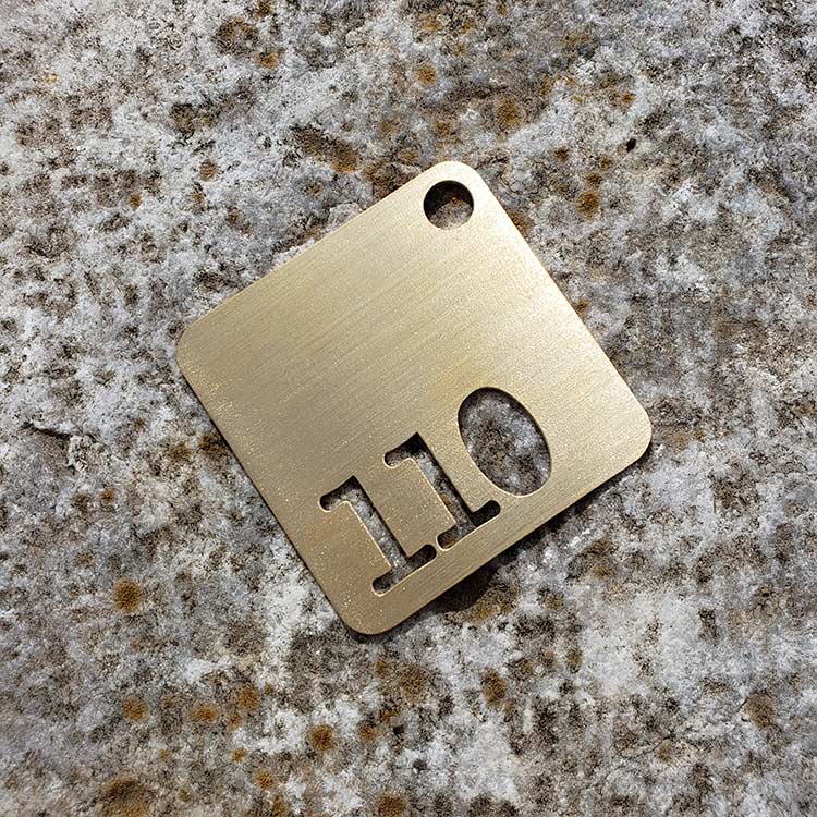 DEFENDER 110 KEY RING BRUSHED BRASS OR STAINLESS STEEL