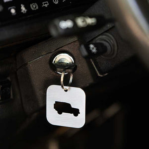 A DEFENDER SILHOUETTE KEY TAG aka THE BOTTLE OPENER