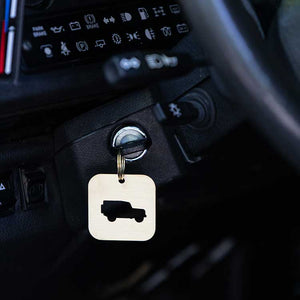 A DEFENDER SILHOUETTE KEY TAG aka THE BOTTLE OPENER
